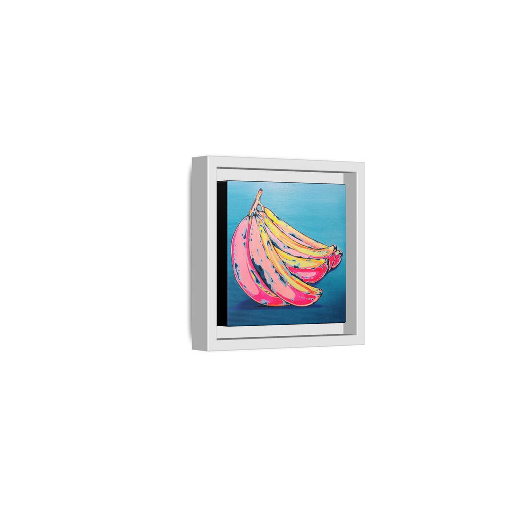 Framed Neon Bananas Canvas Print
