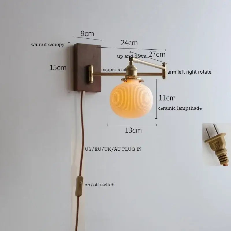 Adjustable brass wall sconce with ribbed glass shade bedroom light