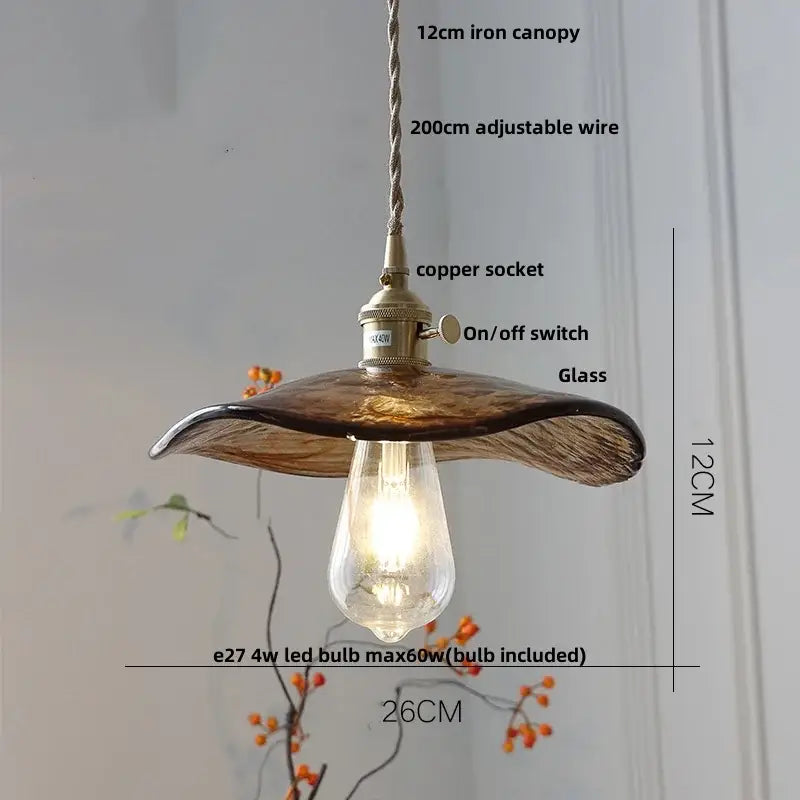 Amber glass pendant light with brass knob switch for dining room