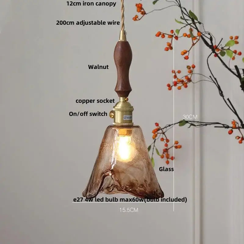 Amber glass pendant light with brass knob switch for dining room