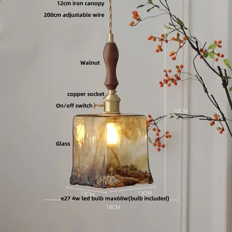 Amber glass pendant light with brass knob switch for dining room