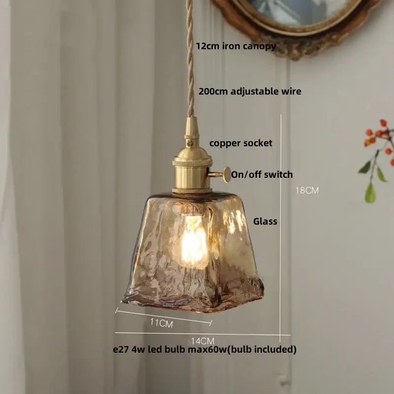 Amber glass pendant light with brass knob switch for dining room