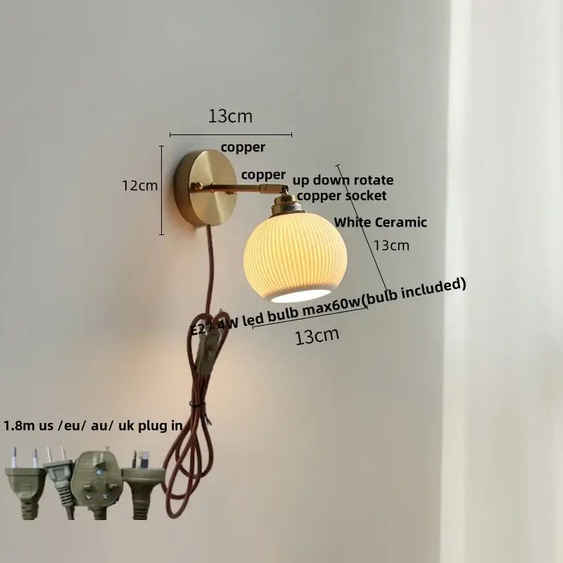 Antique brass and amber glass adjustable wall light bedroom sconce