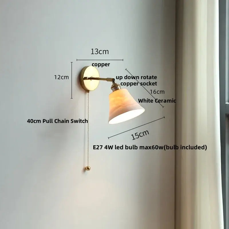 Antique brass and amber glass adjustable wall light bedroom sconce