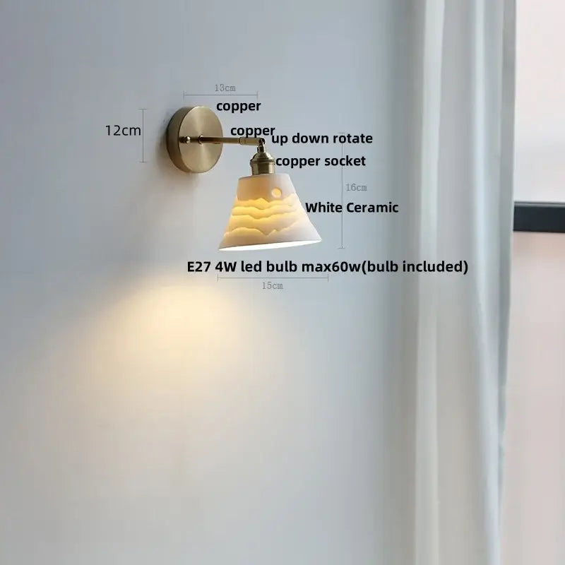 Antique brass and amber glass adjustable wall light bedroom sconce