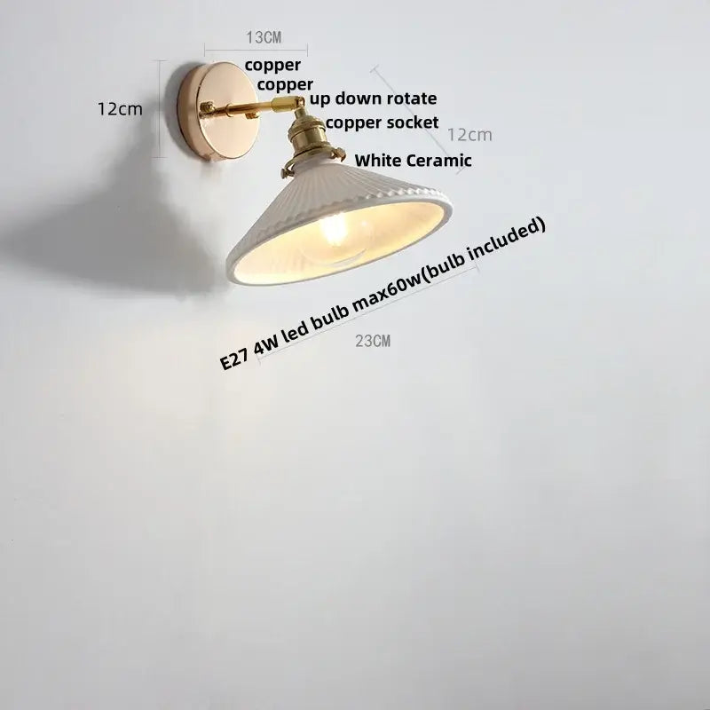 Antique brass and amber glass adjustable wall light bedroom sconce