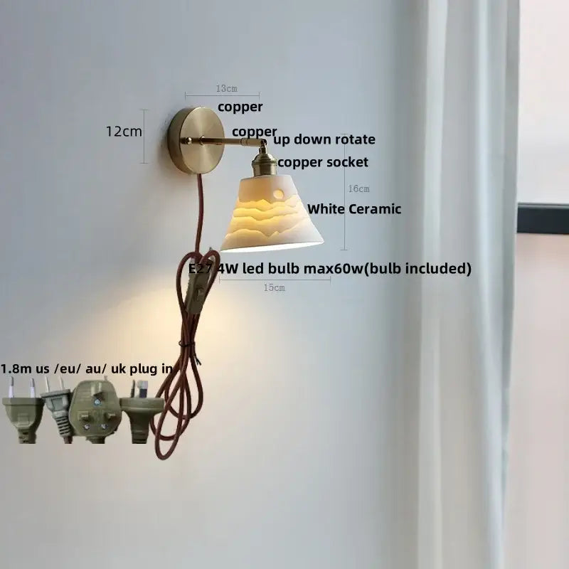 Antique brass and amber glass adjustable wall light bedroom sconce