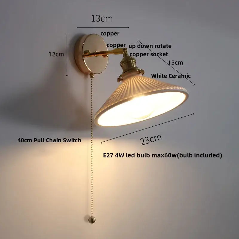Antique brass and amber glass adjustable wall light bedroom sconce