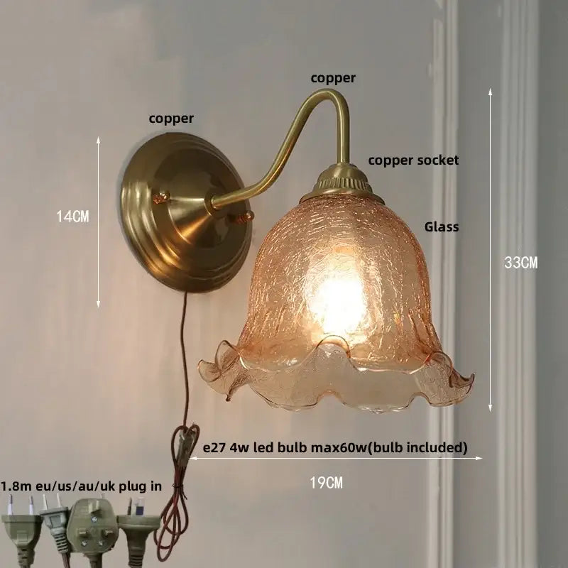 Antique brass and clear glass wall sconce bedroom light