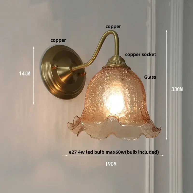 Antique brass and clear glass wall sconce bedroom light