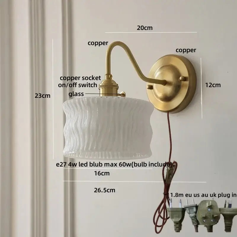 Antique brass and clear glass wall sconce bedroom light