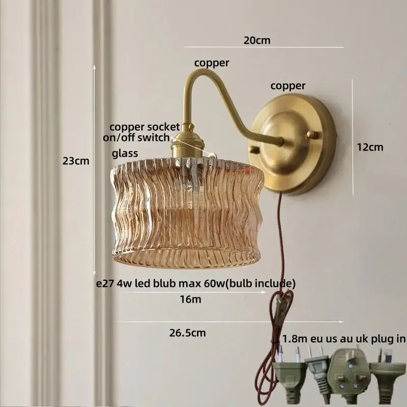 Antique brass and clear glass wall sconce bedroom light