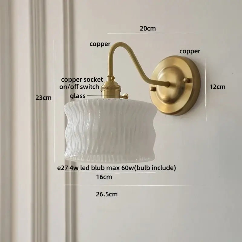 Antique brass and clear glass wall sconce bedroom light
