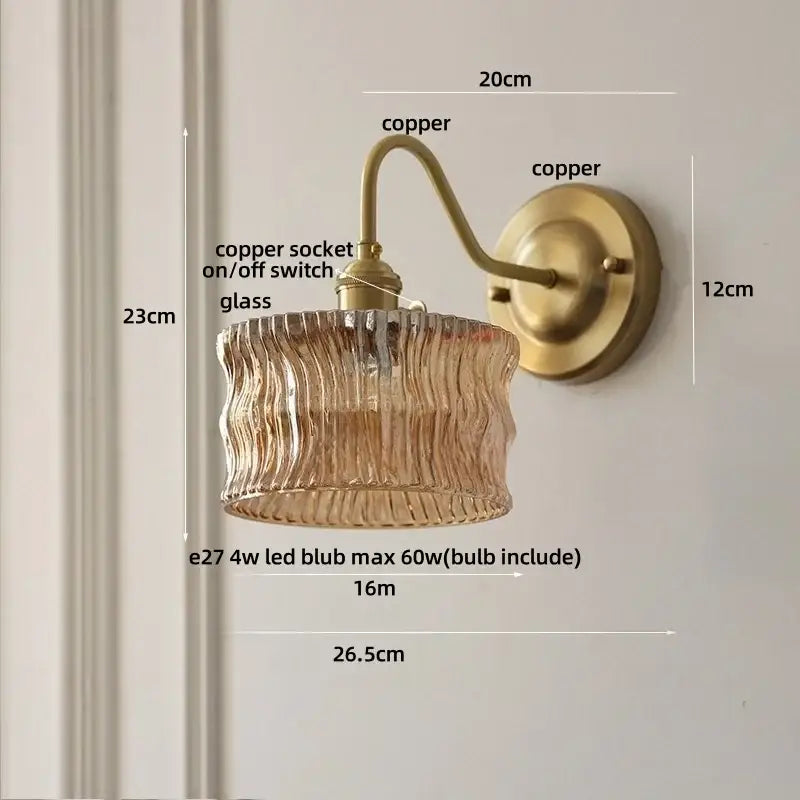 Antique brass and clear glass wall sconce bedroom light