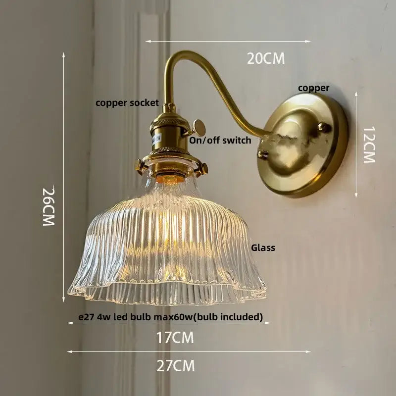 Antique brass and clear glass wall sconce bedroom light