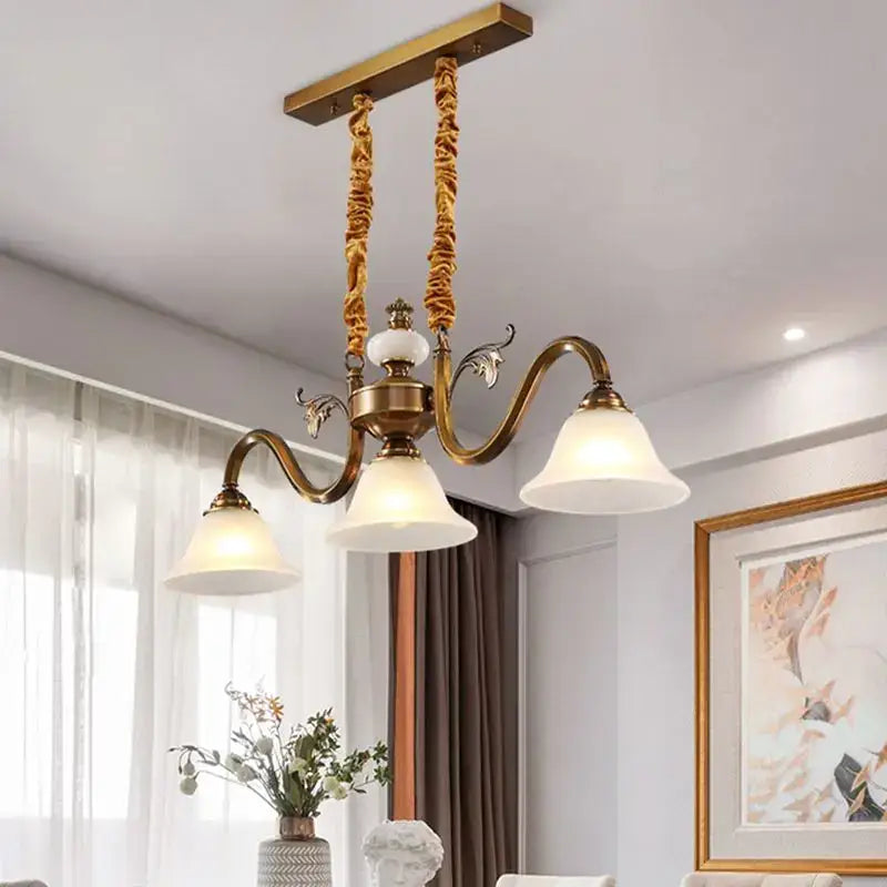 Antique brass decorbites coffee colored three headed pendant light dining room