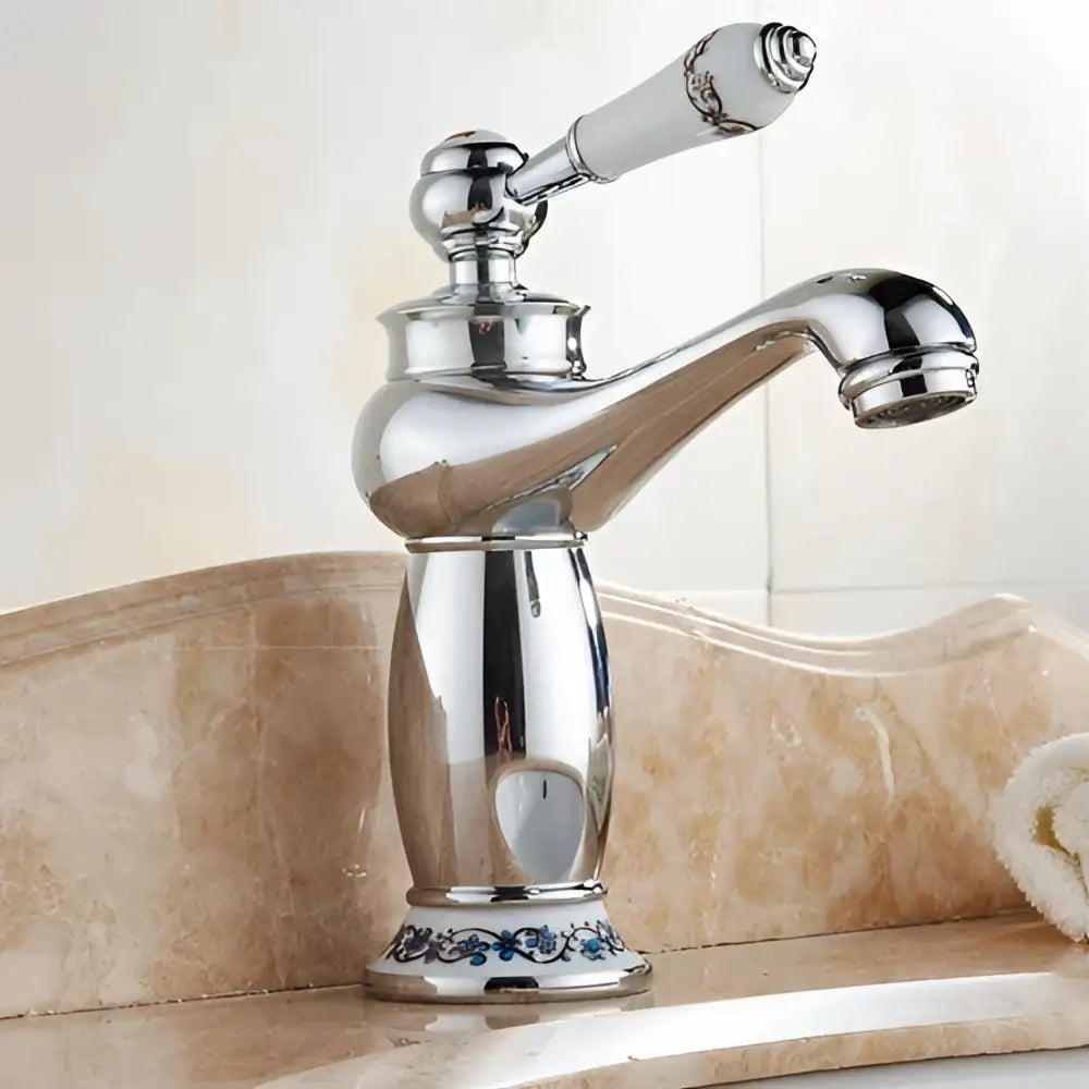 Antique bronze bathroom faucet with white ceramic ornate handle