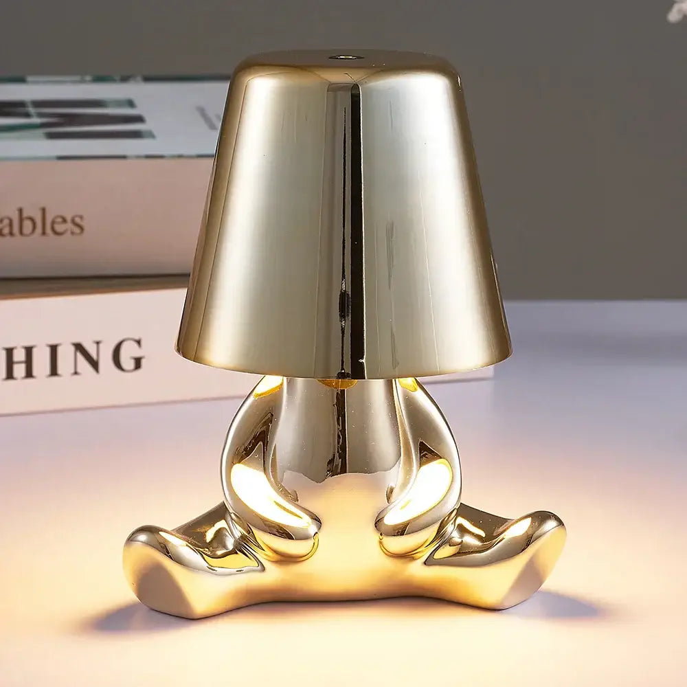 Articulated golden man table lamp for bedroom night light