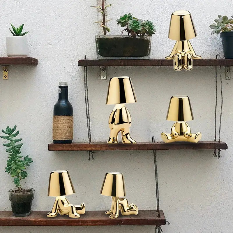 Articulated golden man table lamp for bedroom night light