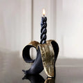 Black and gold banana candlestick holder for dining room decor