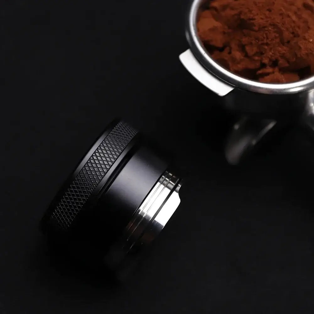 Black and silver espresso distributor coffee leveler kitchen tool