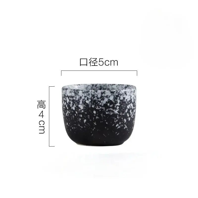 Black speckled ceramic wine sake set with heater for dining room