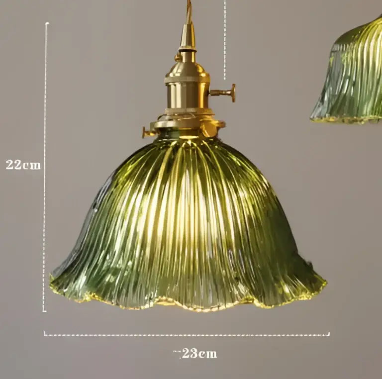 Blue translucent glass pendant lights with brass fixture bedroom