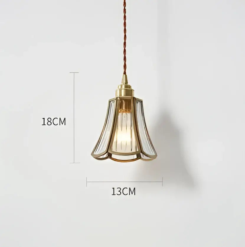 Blue translucent glass pendant lights with brass fixture bedroom