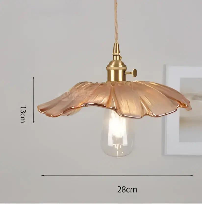 Blue translucent glass pendant lights with brass fixture bedroom