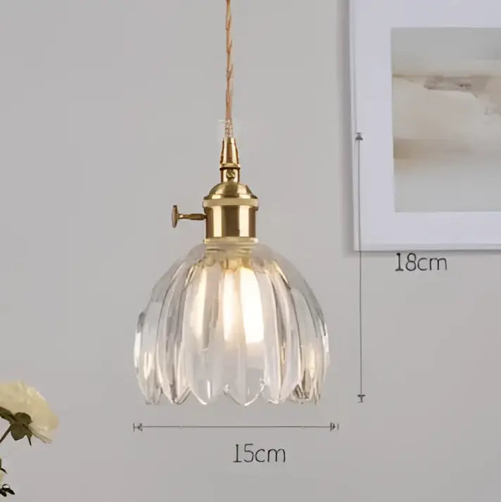 Blue translucent glass pendant lights with brass fixture bedroom