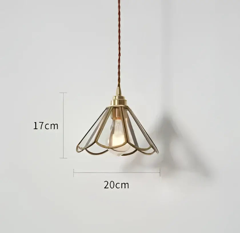 Blue translucent glass pendant lights with brass fixture bedroom