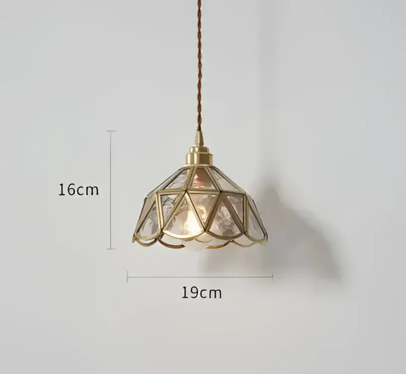 Blue translucent glass pendant lights with brass fixture bedroom
