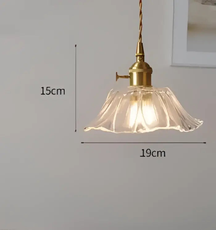 Blue translucent glass pendant lights with brass fixture bedroom
