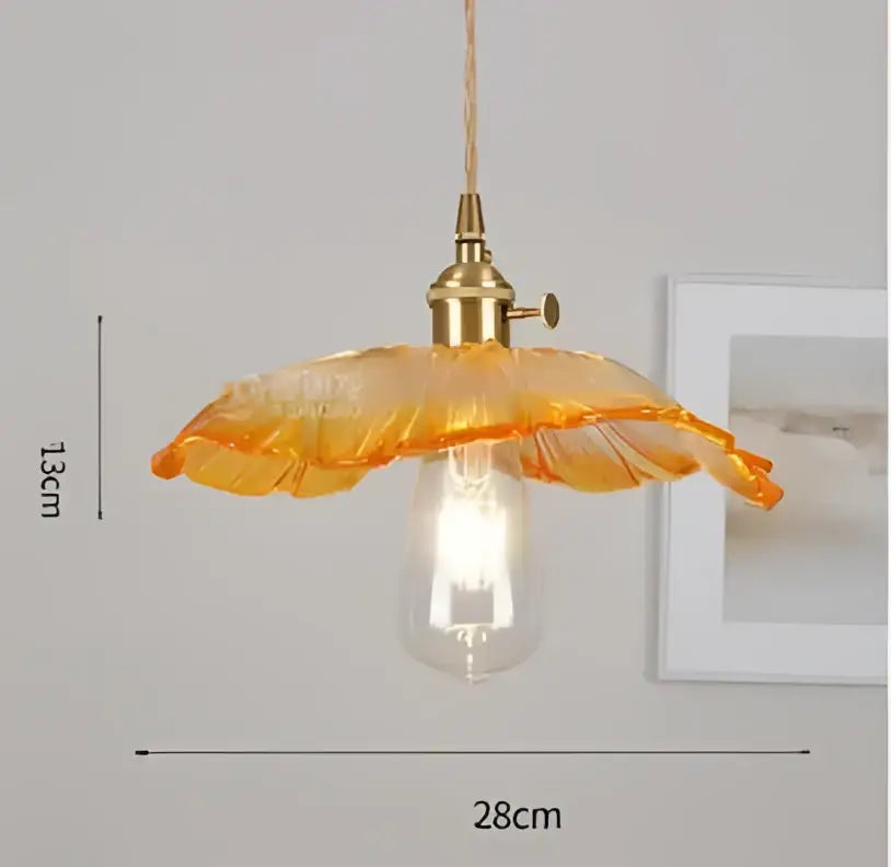Blue translucent glass pendant lights with brass fixture bedroom