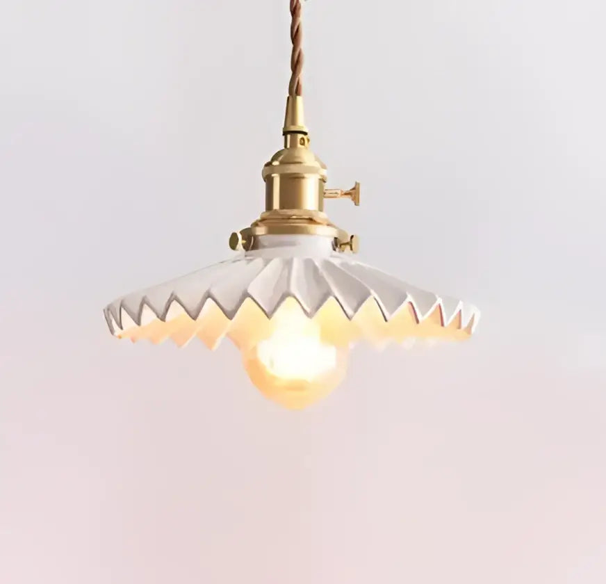 Blue translucent glass pendant lights with brass fixture bedroom