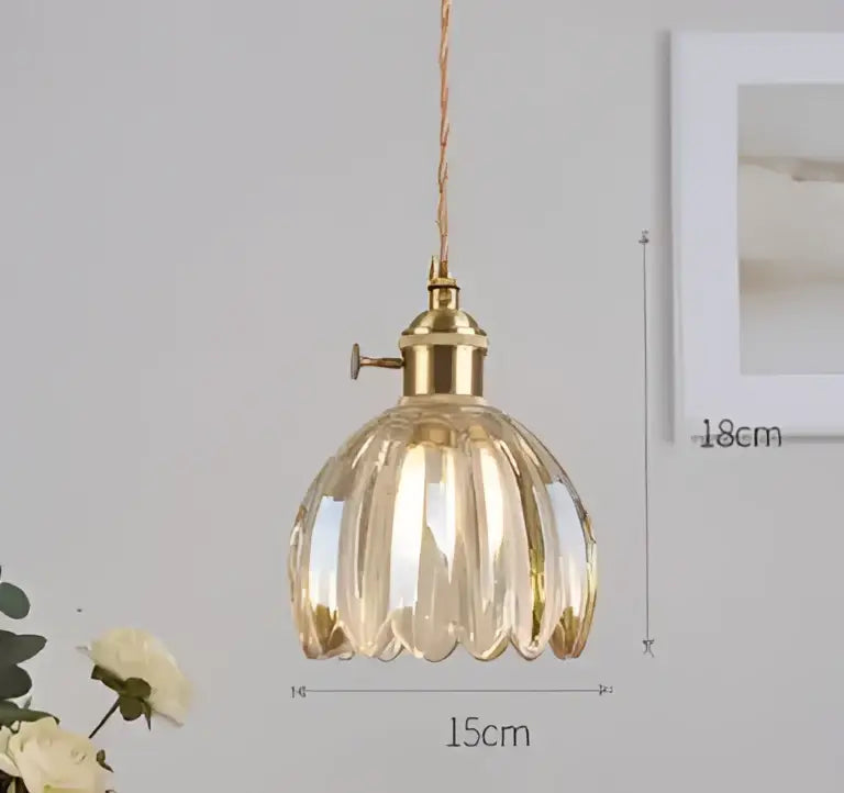 Blue translucent glass pendant lights with brass fixture bedroom