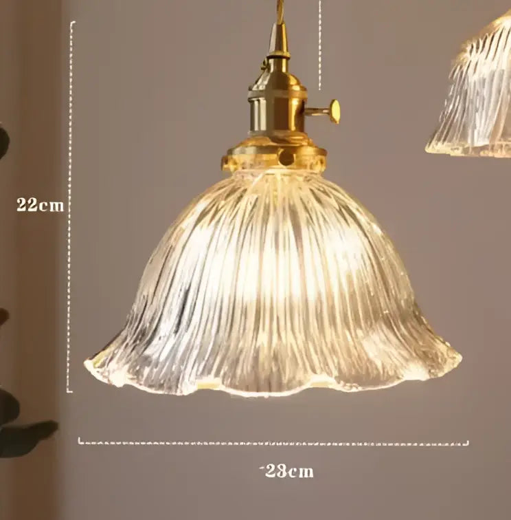 Blue translucent glass pendant lights with brass fixture bedroom