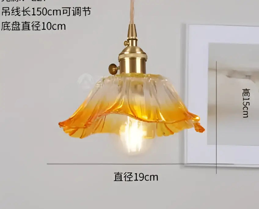 Blue translucent glass pendant lights with brass fixture bedroom