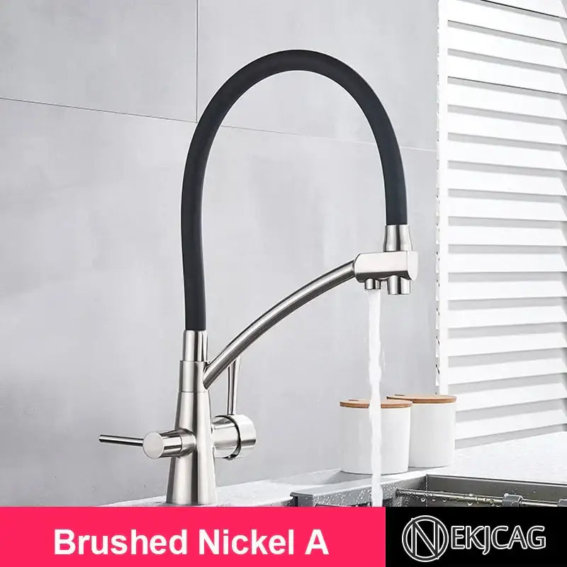 Brushed gold and black kitchen faucet with dual handles and filter
