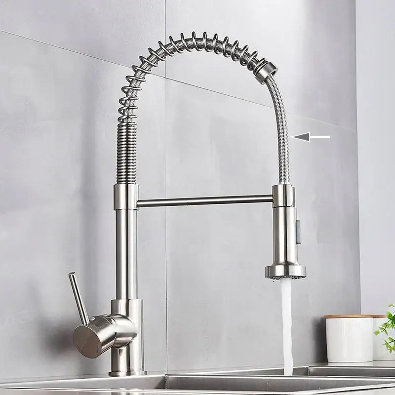 Brushed nickel coiled spring kitchen faucet with pull down sprayer