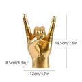 Chic black glossy rock hand gesture sculpture living room decor