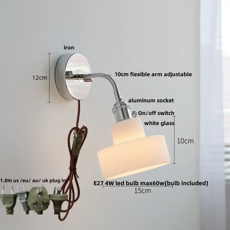 Chrome adjustable arm wall lamp with ribbed glass shade – bedroom