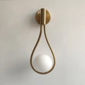 Chrome teardrop wall sconce with white glass ball for bedroom