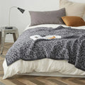 Cozy leopard print knitted cream & gray bedroom throw blanket