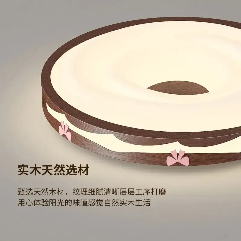 Cream wind walnut round bedroom light with pink bow hanging bulb