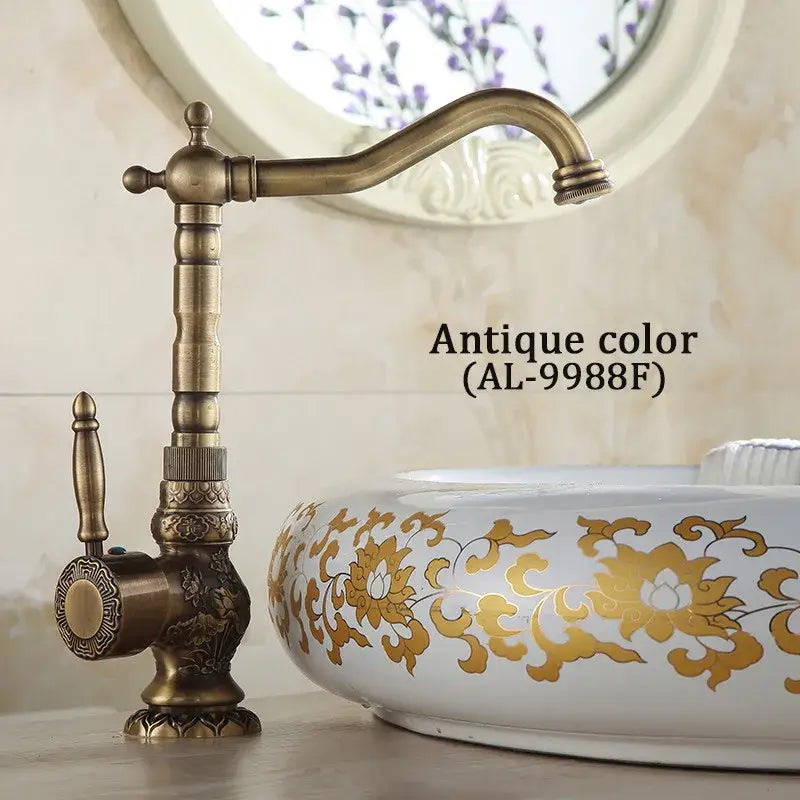 Antique brass basin faucet with engraved floral detail kitchen tap