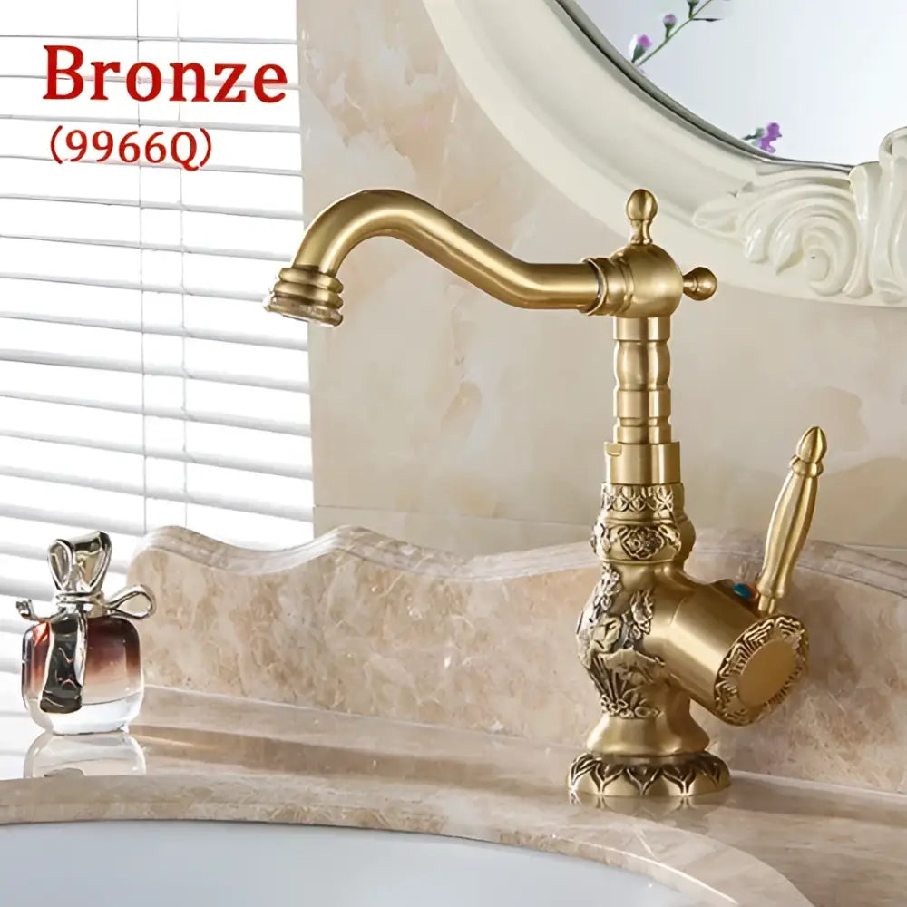 Antique brass basin faucet with engraved floral detail kitchen tap