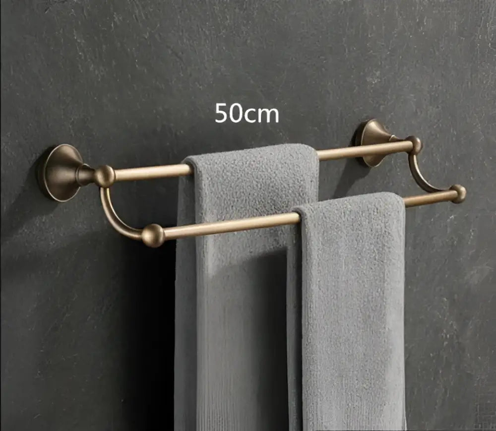 Antique brass bathroom accessory set with wall shelf
