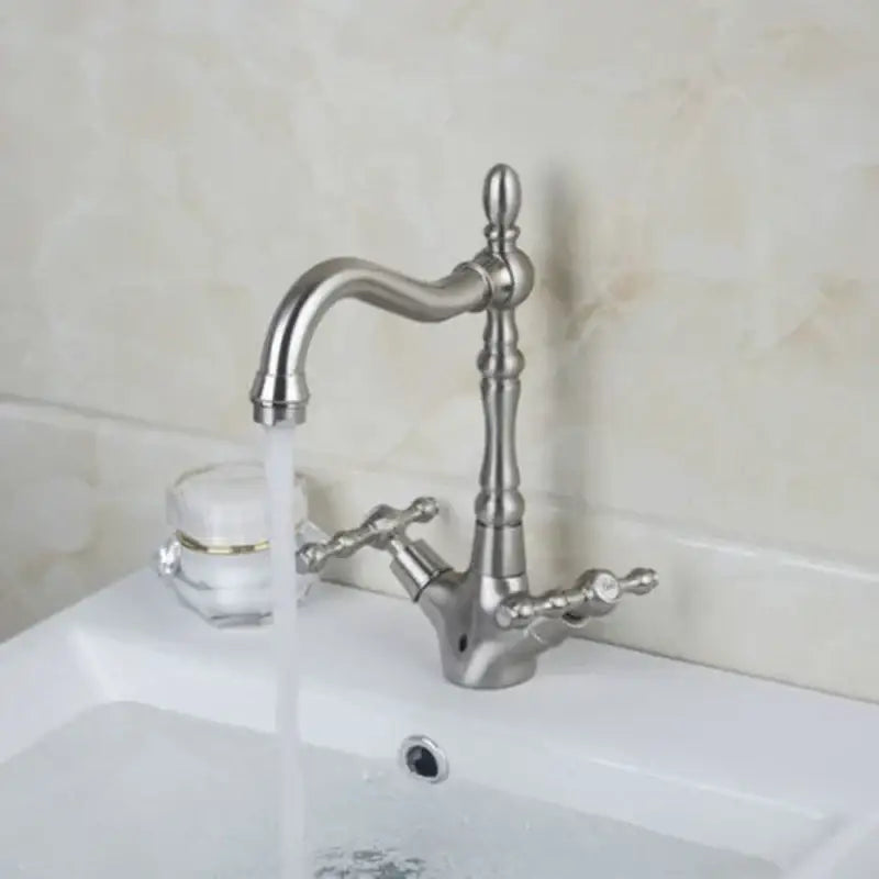 Antique brass dual handle kitchen faucet with swivel spout