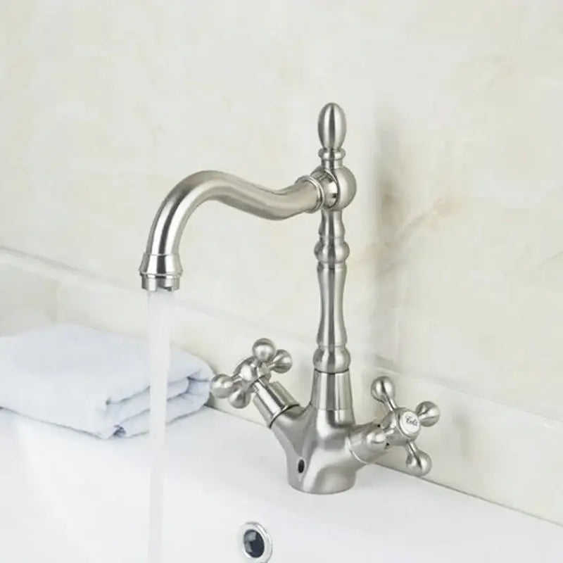 Antique brass dual handle kitchen faucet with swivel spout